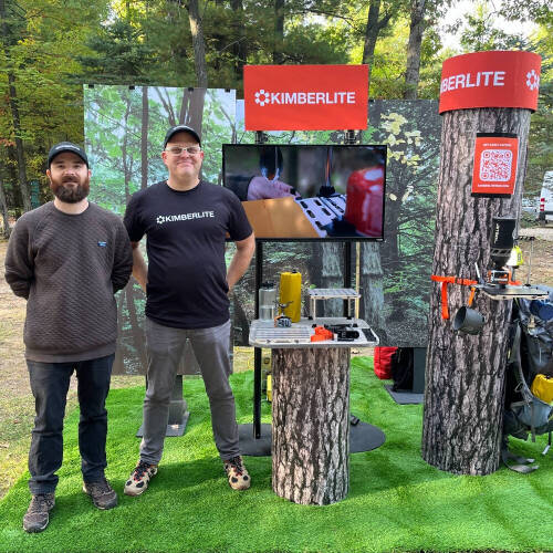 2 PCE alums who started their own business pose next to their product